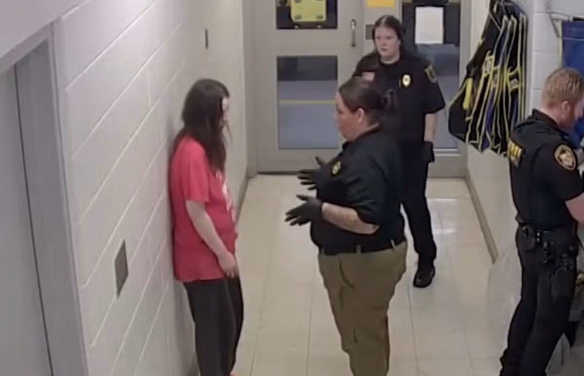 Elizabeth Siders is inspected by officers