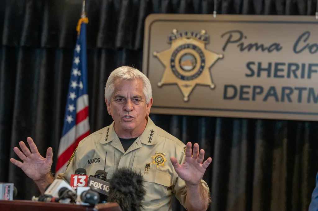 Pima County Sheriff Chris Nanos speaks to the media at a press conference.
