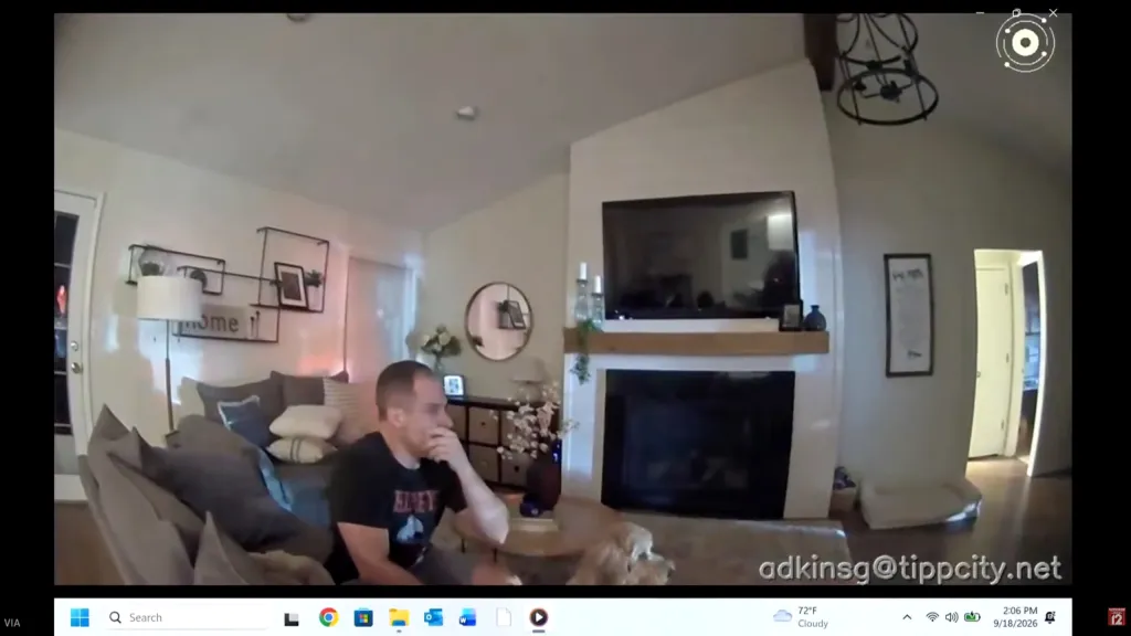 Former "American Idol" contestant Caleb Flynn sitting in a living room during his trial.