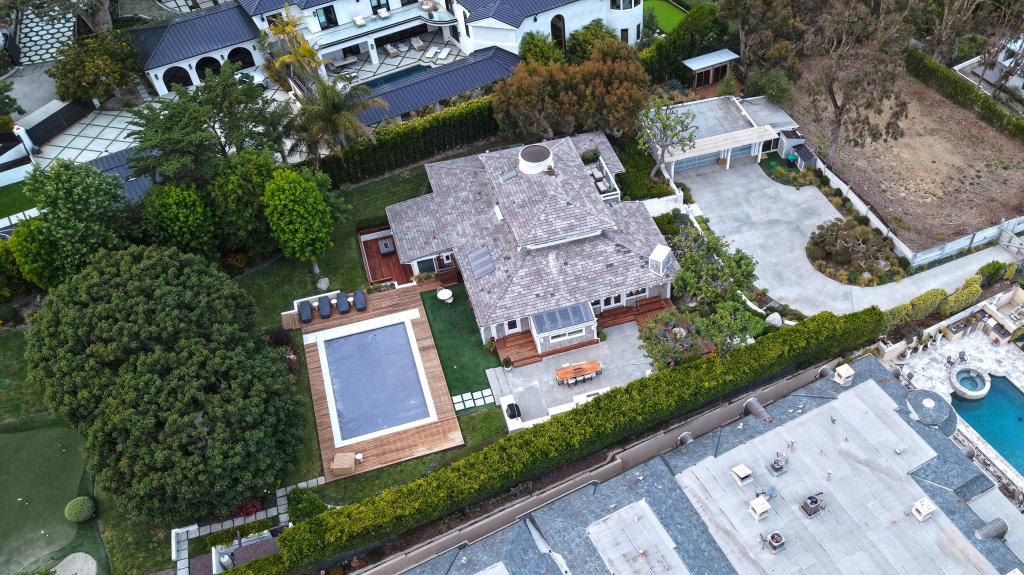 Aerial view of Kamala Harris's $8.15 million home on Point Dume in Malibu, showing a house with a pool and landscaping.