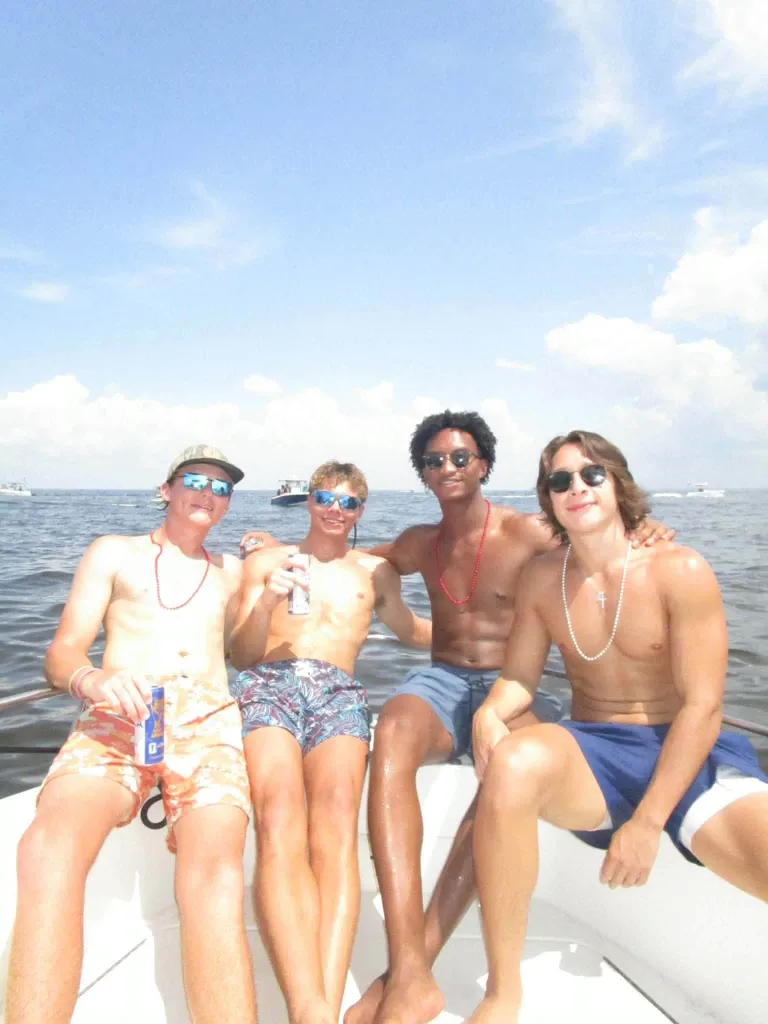 Nolan Wells (second from right) with friends on a boat during July 4 celebrations.