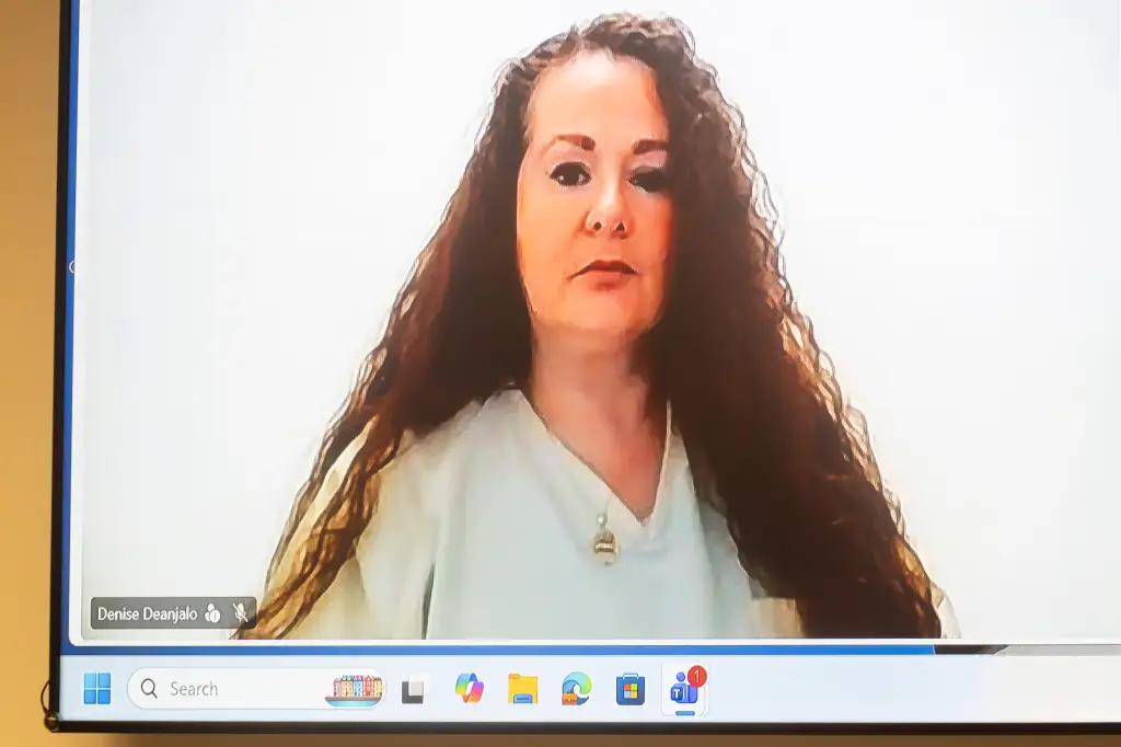 Christa Gail Pike appears remotely via video link during a court hearing.