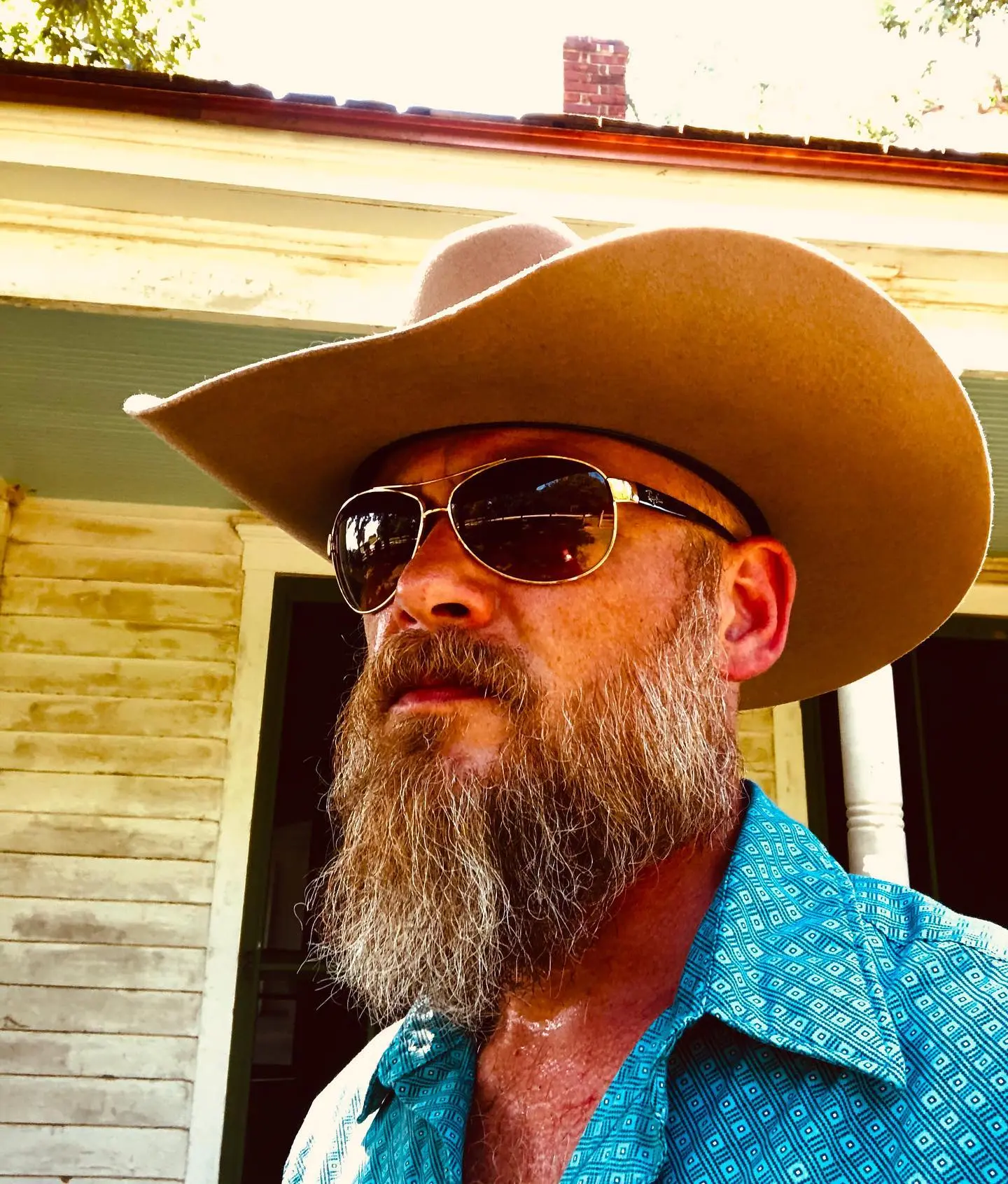 Bryan Seaver wearing a cowboy hat and sunglasses.