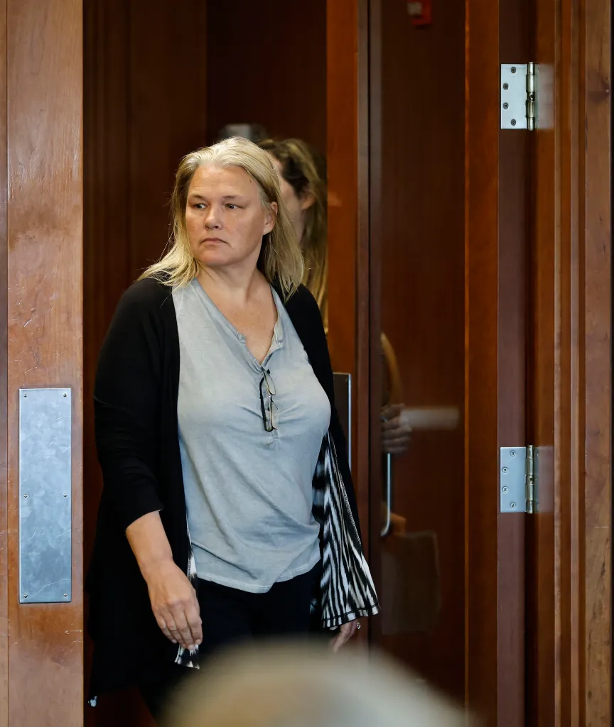 Dawn Light entering the Plymouth District Court for charges of intimidating a jury member.