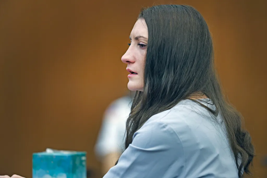 Lindsay Clancy tries to hold back tears during her murder trial.