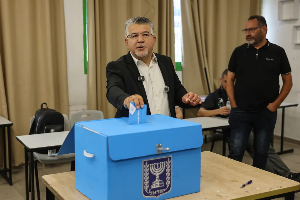 Yousef Jabareen, leader of Israel's Arab-led Joint List political alliance, casts his ballot at a polling station in Umm al-Fahm, Israel.