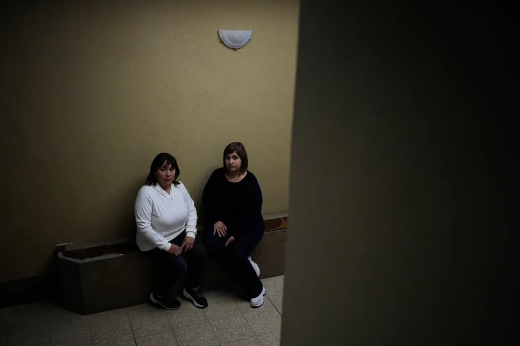 Rosana Vaccon and Andrea Martinez, part of a group of women who allege they were subjected to human trafficking and forced labor at Opus Dei centers in Argentina, pose for a photo in Buenos Aires.