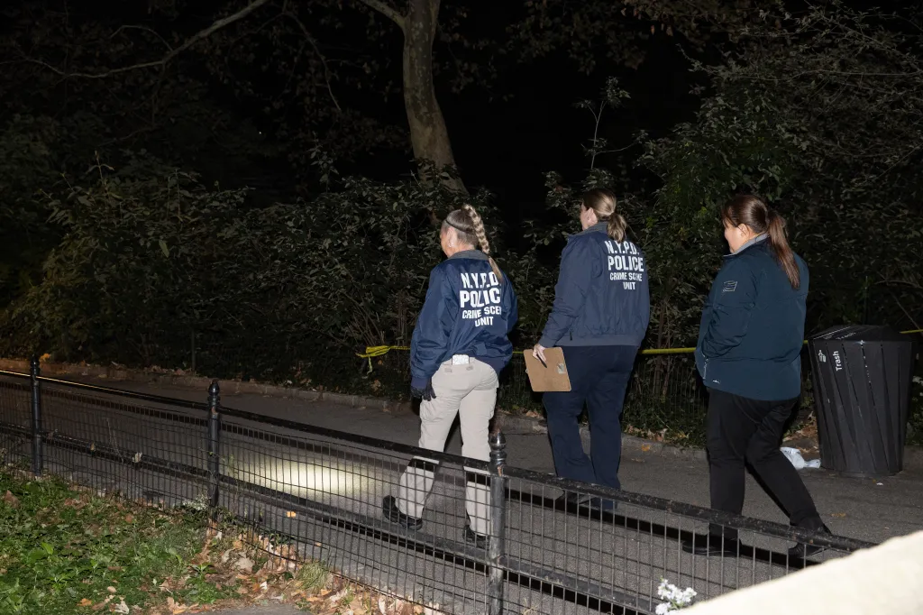 Crime Scene Unit officers arrive at the scene where the 39-year-old victim was raped at East 67th Street and the East Drive.