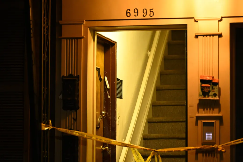 NYPD officers work the scene where 24-year-old Tania Morales died after she was assaulted inside a residence on Park Drive East.