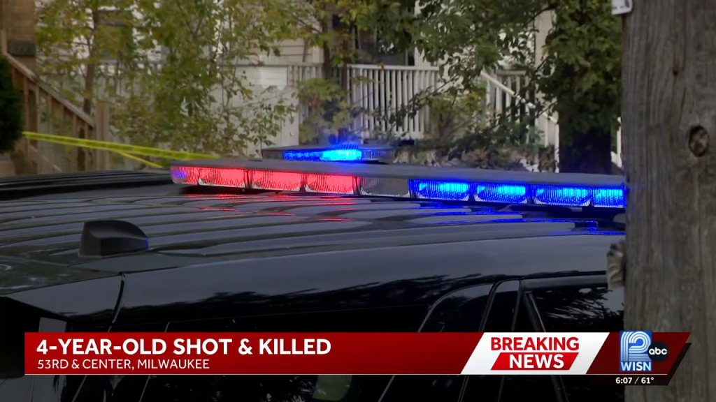 Police vehicle at the scene of the fatal shooting of a four-year-old child in Milwaukee.