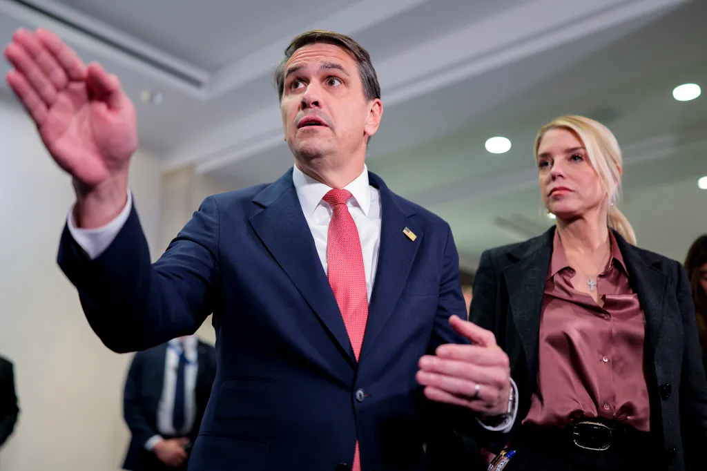 Then-Deputy Attorney General Todd Blanche and then-Attorney General Pam Bondi speak with the media.
