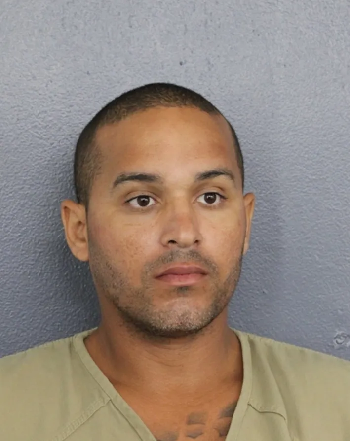 Police booking photo of Michael E. Polanco.