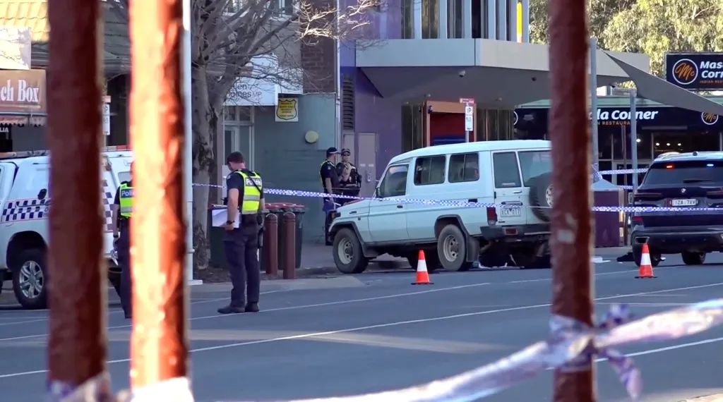 Police officers stand guard at the crime scene in Wangaratta.
