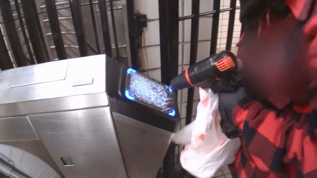 A flannel-wearing vandal used an automatic center punch and a drill to destroy the tap machines at the Church Avenue subway station on the B and Q line, cops said.
