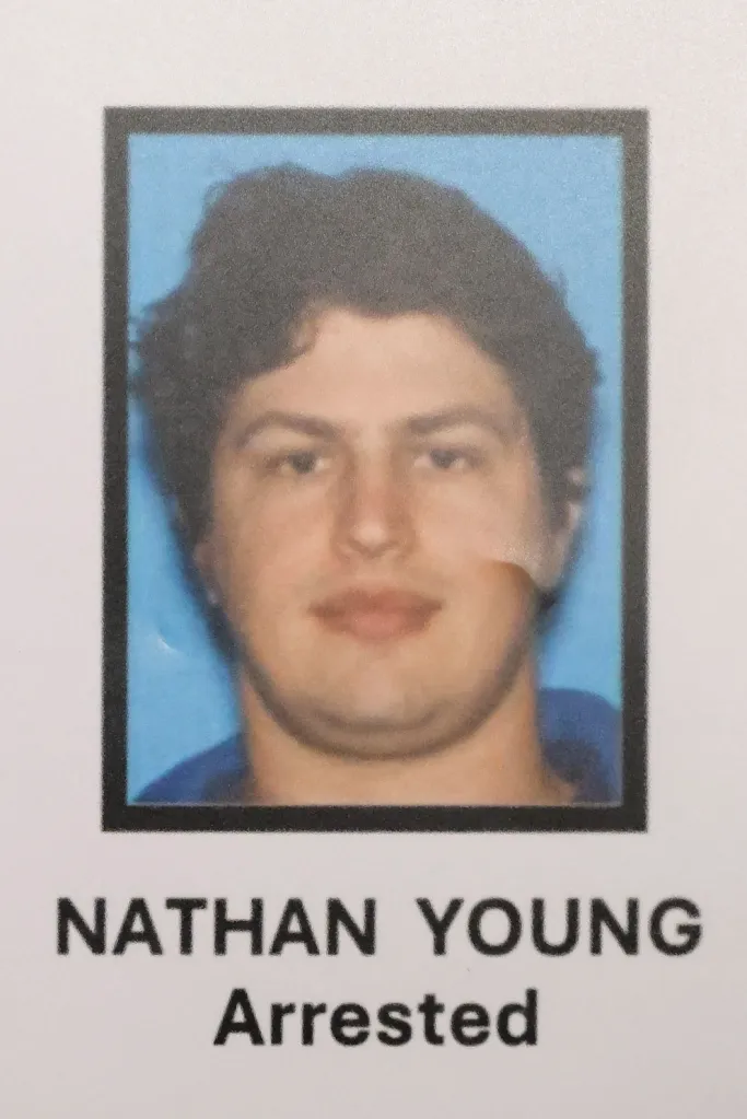 A photograph of Nathan Young with the text "Arrested" underneath.